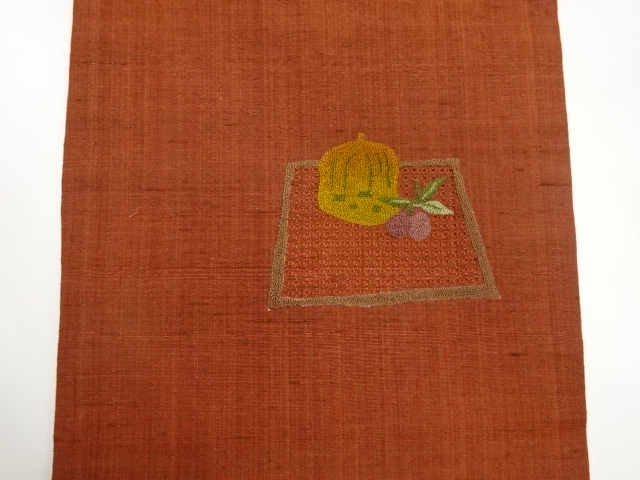  手織り紬汕頭相良刺繍変わり色紙に果実模様名古屋帯